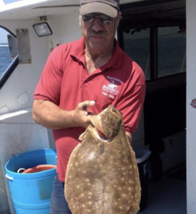 Andrew Dangelo holding a fish